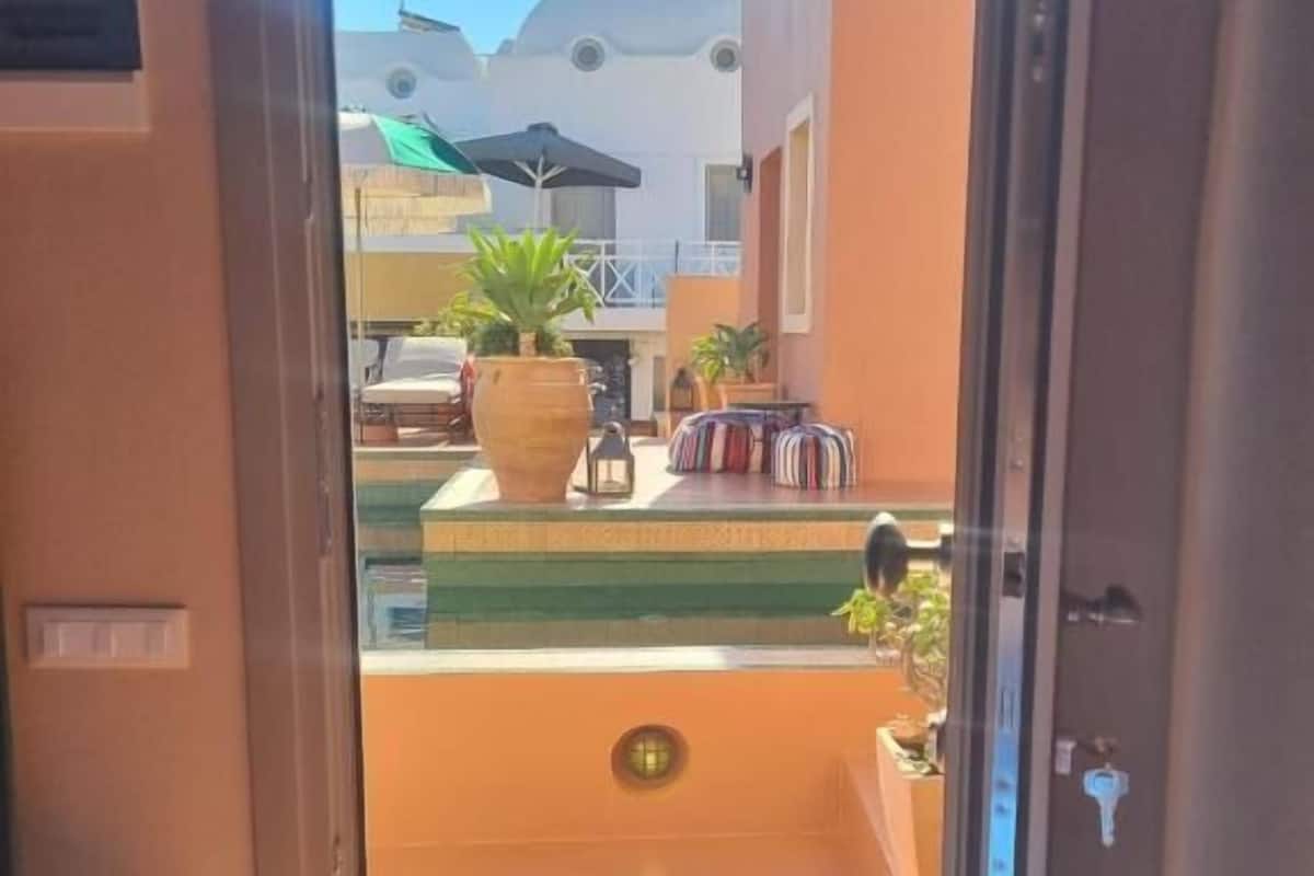 Courtyard Suite Split Level Sea View | 1 bedroom, iron/ironing board, free WiFi, bed sheets