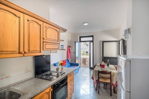 Family Apartment, 2 Bedrooms (Marina Di Camerota Apt front Sea) | Private kitchen | Fridge, oven, stovetop, coffee/tea maker
