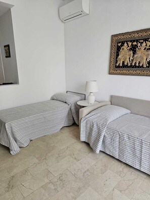 2 quartos, ferros/tábuas de passar roupa, Wi-Fi, roupa de cama