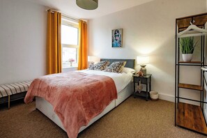 3 bedrooms, desk, iron/ironing board, travel cot