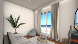 A modern living room with a sofa, a coffee table, a potted plant, and a view of the beach through a sliding glass door. - Aliki s Summerhouse 2 (Zakynthos)