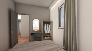 A bedroom with a bed, a desk, a wardrobe, and a window. - Aliki s Summerhouse 2 (Zakynthos)