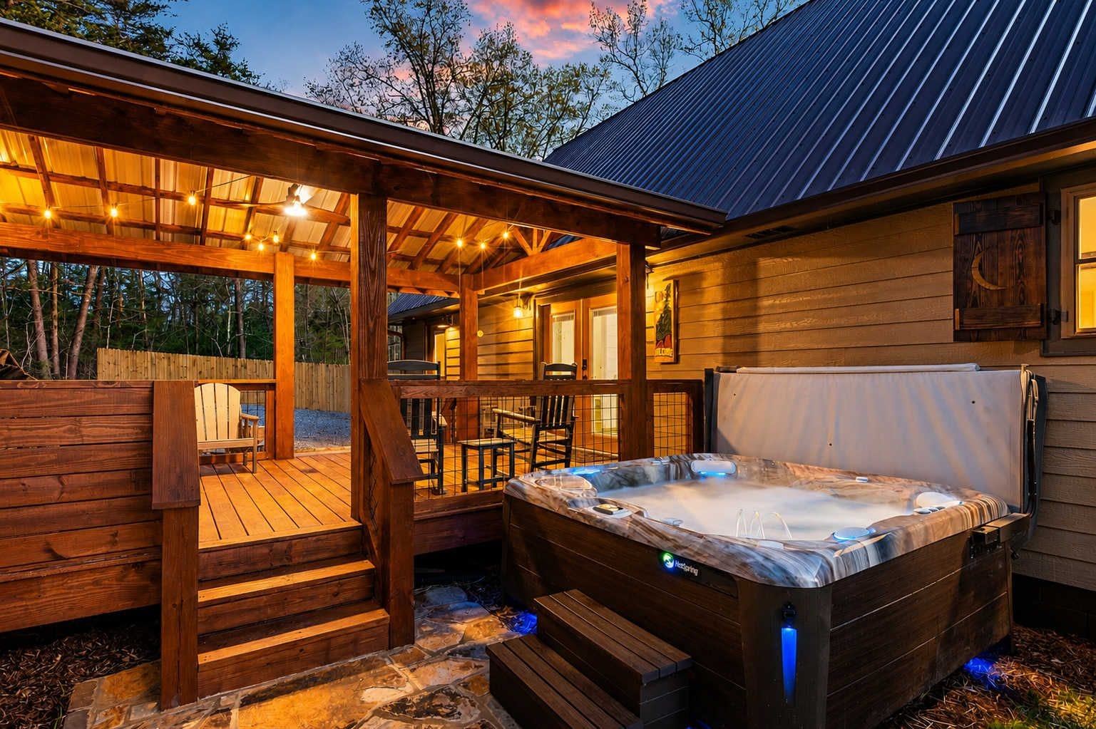A hot tub with a wooden deck and outdoor seating area.