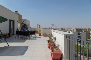 Terrace/patio - Settle Inn Sodic Eastown Studio (New Cairo)