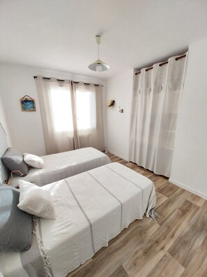 2 bedrooms, iron/ironing board, WiFi, bed sheets