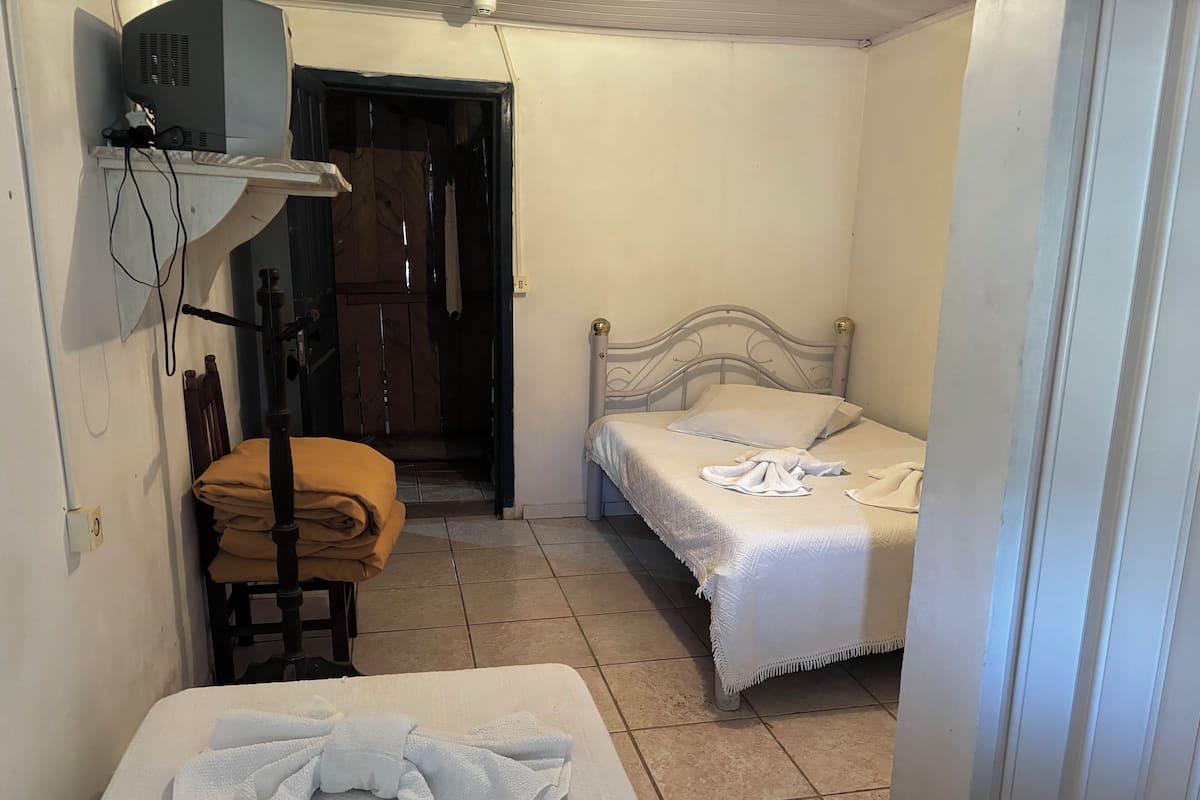 Suíte standard, banheiro privativo | 1 quarto, berços grátis, Wi-Fi de cortesia, roupa de cama