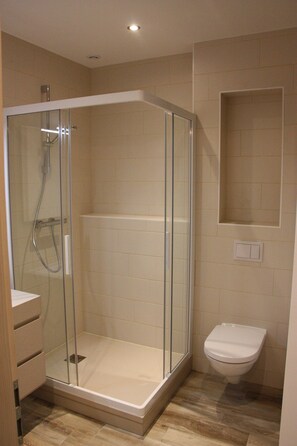 Hair dryer, towels, soap, toilet paper