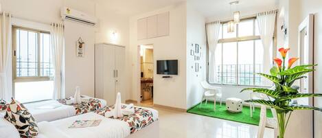 4 slaapkamers, een strijkplank/strijkijzer, gratis wifi, beddengoed