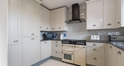 Single level Holiday Home within yards of the Camel Estuary, parking and garden