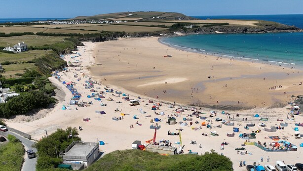 A beach with tents and people. - Kegyn - Harlyn Bay Cornwall,  sleeps 5 guests & accepts pets (Harlyn Bay)