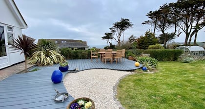 Polcarrek contemporary holiday home with parking and garden. Balcony with rural views