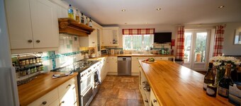 Polcarrek contemporary holiday home with parking and garden.  Balcony with rural views