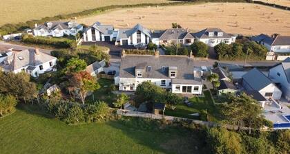 Four bedrooms with garden and driveway parking. Pets welcome.