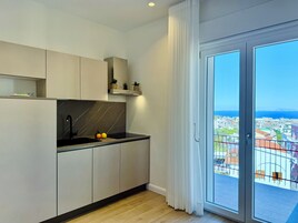 Apartamento, vistas al mar | Cocina privada
