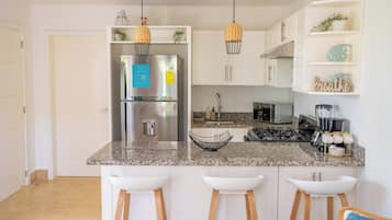 Fridge, microwave, stovetop, coffee/tea maker