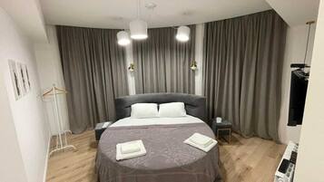 2 chambres, fer et planche à repasser, Wi-Fi, draps fournis