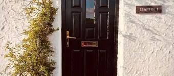 Fisherman’s Cottage by the Beach and Lighthouse