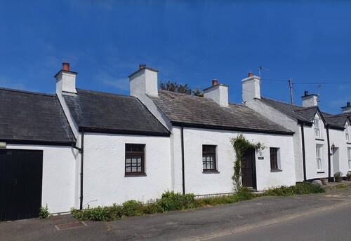 Fisherman’s Cottage by the Beach and Lighthouse