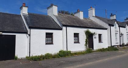 Fisherman’s Cottage by the Beach and Lighthouse