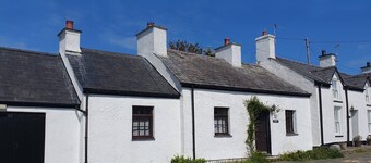 Fisherman’s Cottage by the Beach and Lighthouse