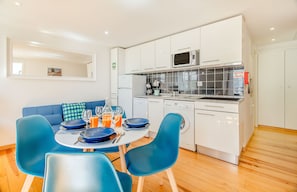 Basic Apartment, 2 Bedrooms, Non Smoking, Kitchenette | Living area | 32-inch TV with cable channels - Charming Flat in Alfama (Lisbon)