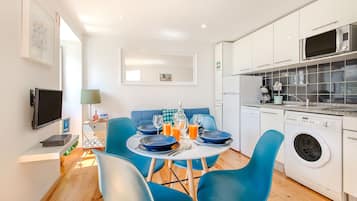 Apartamento básico, 2 quartos, para não fumantes, cozinha americana | Cozinha americana privada | Máquina de café expresso, chaleira elétrica, torradeira