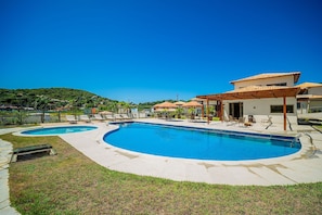 Deluxe House, 4 Bedrooms, Air conditioning | Pool | Outdoor pool, open 9:00 AM to 9:00 PM, pool umbrellas, sun loungers