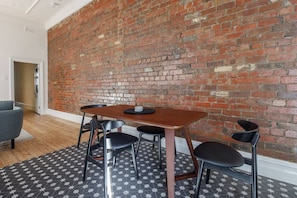 Dine inside around the four-seater timber table or opt for an alfresco experience on the courtyard.