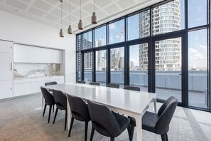 Whether you’re hosting a meeting or sharing a meal, the building's refined shared meeting space offers a versatile setting with a stylish edge—ideal for work or casual gatherings.