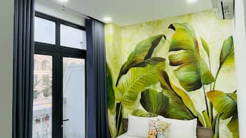 Deluxe Room, Balcony, City View | Desk, laptop workspace, free WiFi