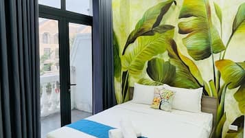 Deluxe Room, Balcony, City View | Desk, laptop workspace, free WiFi