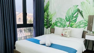 Deluxe Room, Balcony, City View | Desk, laptop workspace, free WiFi