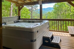 Outdoor spa tub - Peaceful 2BR Cabin with Full Kitchen, Wifi, Gas Grill, and Hot Tub (Bryson City)