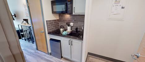 Fridge, microwave, coffee/tea maker, toaster