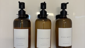 Three bottles of shampoo, conditioner, and body wash. - Juniper Motel*Double Queen*RM19*Dock*ATV Access*Waterfront*Pet Friendly*Boat Rentals (Greenville)