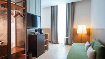 Suite, 1 habitación, vista a la ciudad, en esquina | 1 habitación y ropa de cama de alta calidad