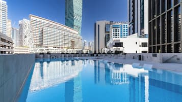 Outdoor pool, pool umbrellas, pool loungers