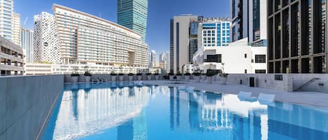 Outdoor pool, pool umbrellas, pool loungers