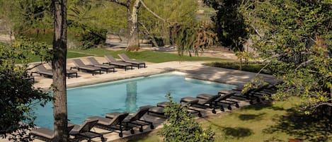 Indoor pool, seasonal outdoor pool, pool umbrellas, pool loungers