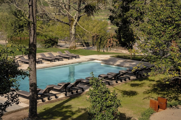 Indoor pool, seasonal outdoor pool, pool umbrellas, sun loungers