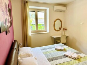 1 chambre, fer et planche à repasser, Wi-Fi, literie fournie