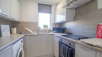 Microwave, toaster, cookware/dishes/utensils
