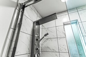 Shower, hair dryer, towels, soap