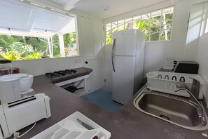 Fridge, stovetop, coffee/tea maker, cookware/dishes/utensils