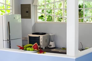 Fridge, stovetop, coffee/tea maker, cookware/dishes/utensils