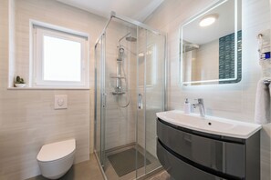 Hair dryer, towels, soap, toilet paper