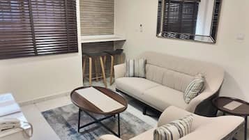 Deluxe Apartment, Balcony, City View | Living area