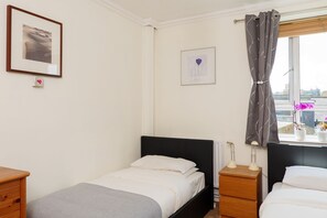 2 dormitorios, tabla de planchar con plancha, wifi gratis y ropa de cama