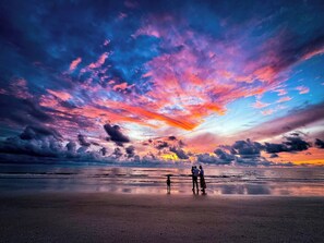 On the beach, sun-loungers, beach towels