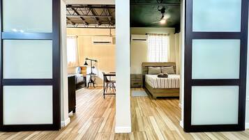 2 bedrooms, desk, laptop workspace, iron/ironing board